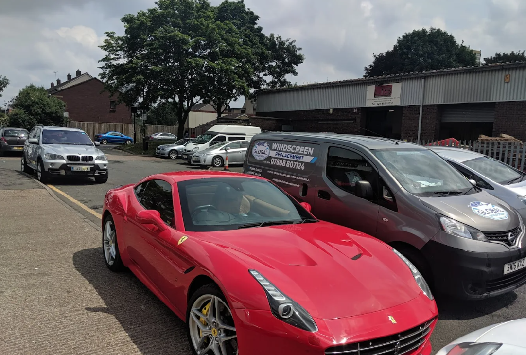 Sports car glass replacement — Ferrari alongside Global Windscreen van